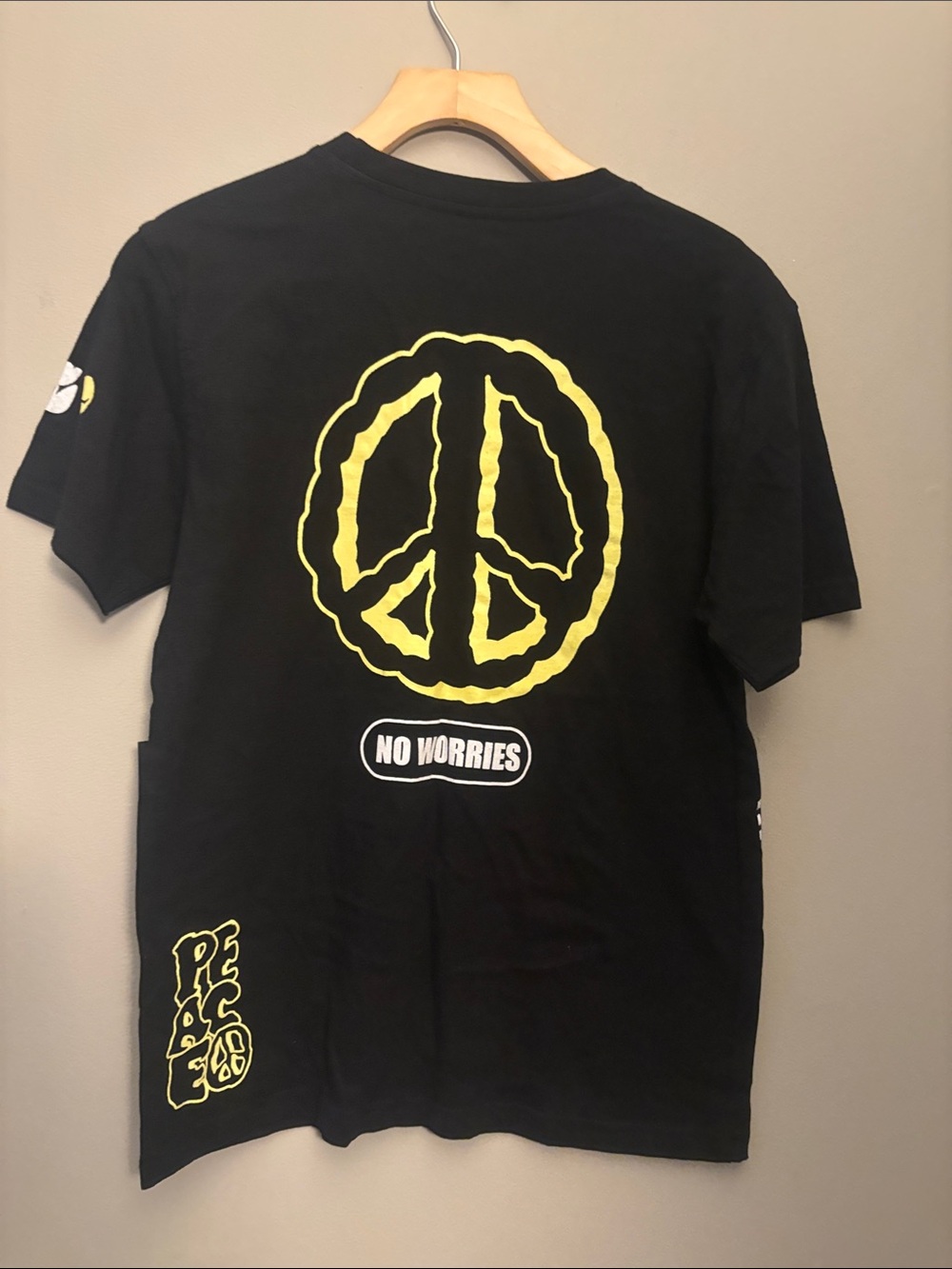 Brooklyn Supply Co. Black Graphic 'Peace' Tee with Yellow Accents